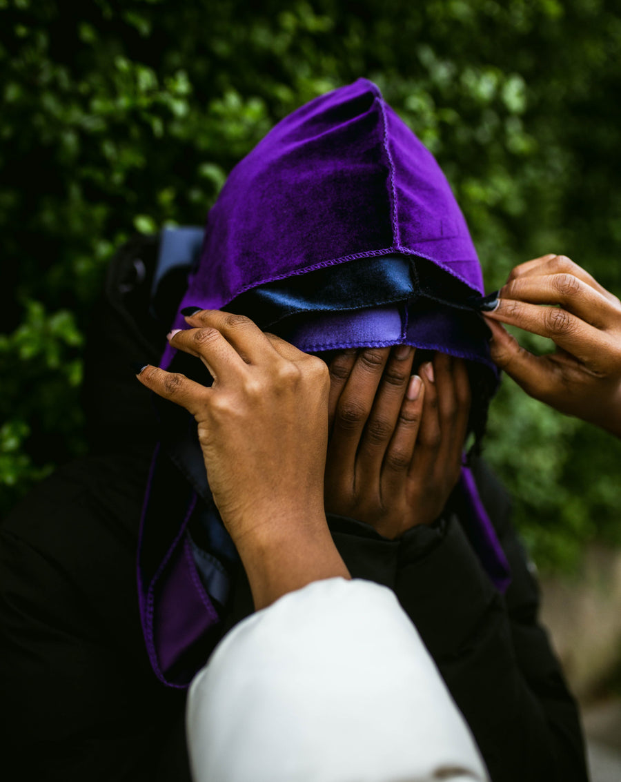purple durag layered on top of 2 other durags
